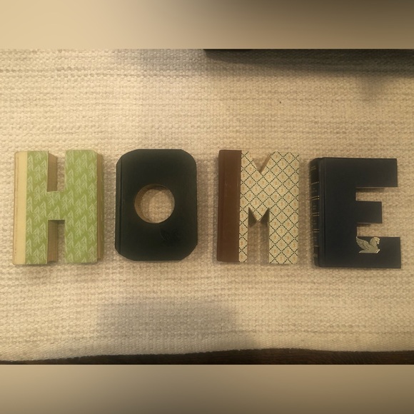 Anthropologie: Hand cut letters from Reader’s Digest books. Spells out “HOME.” - Picture 3 of 15